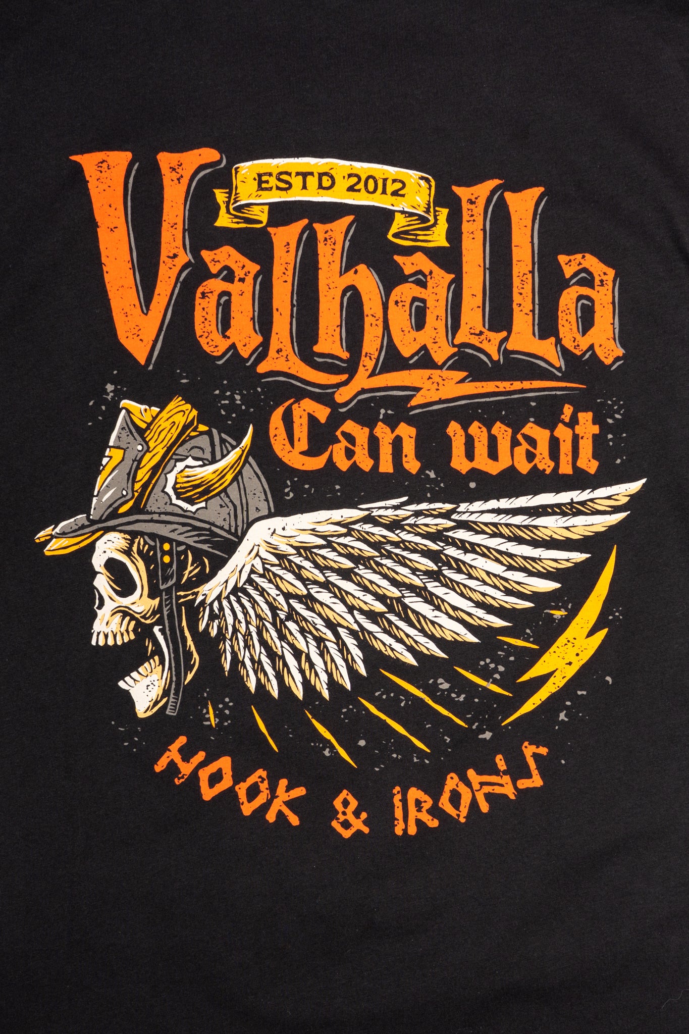Black t-shirt with Valhalla graphic design featuring a skull and wings.