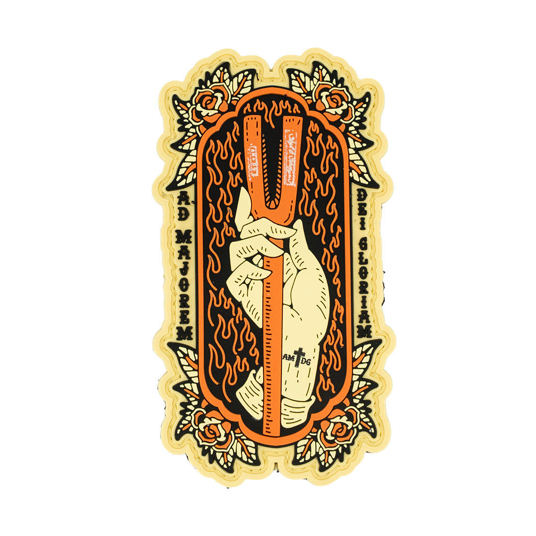 Decorative PVC Patch with a hand holding a halligan and flames, surrounded by floral elements on a white background.