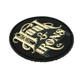Black patch with creme text on a white background