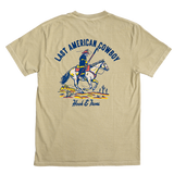 Khaki t-shirt with 'Last American Cowboy' graphic on a white background