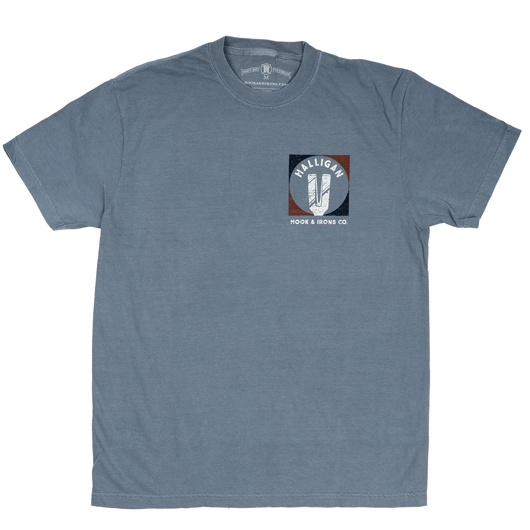 Blue t-shirt with halligan logo on the chest against a white background