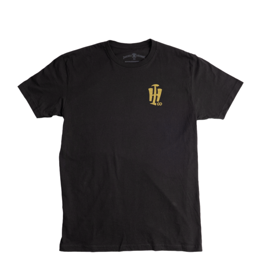 Black t-shirt with a yellow logo on a white background